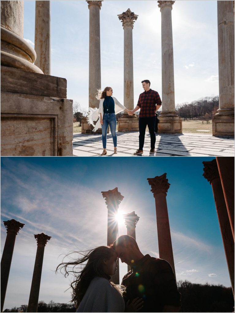couple holds hands in front of the columns at the national arboretum