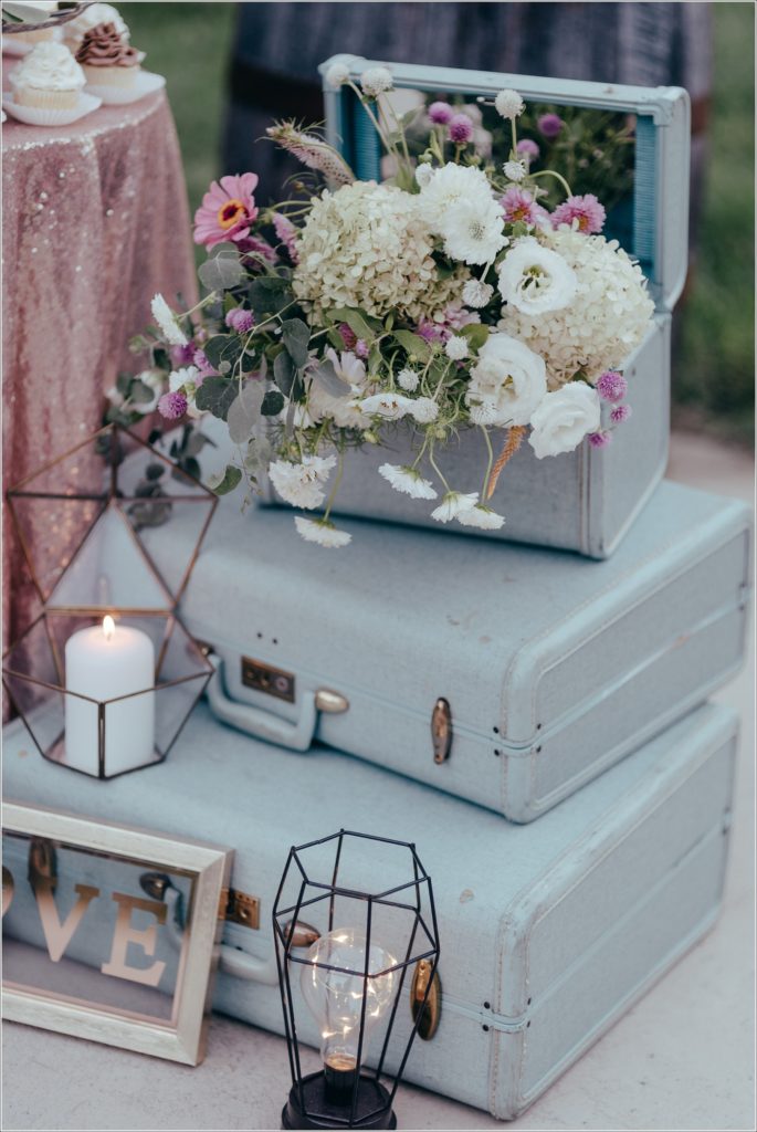pink and green romantic wedding table setting and chest