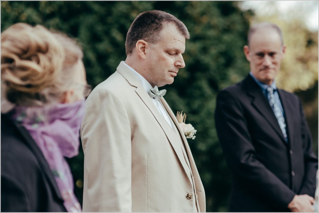 groom walks down aisle and waits for bride at kings contrivance restaurant