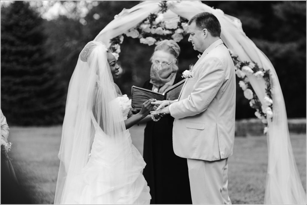 bride and groom during ceremony at kings contrivance restaurant