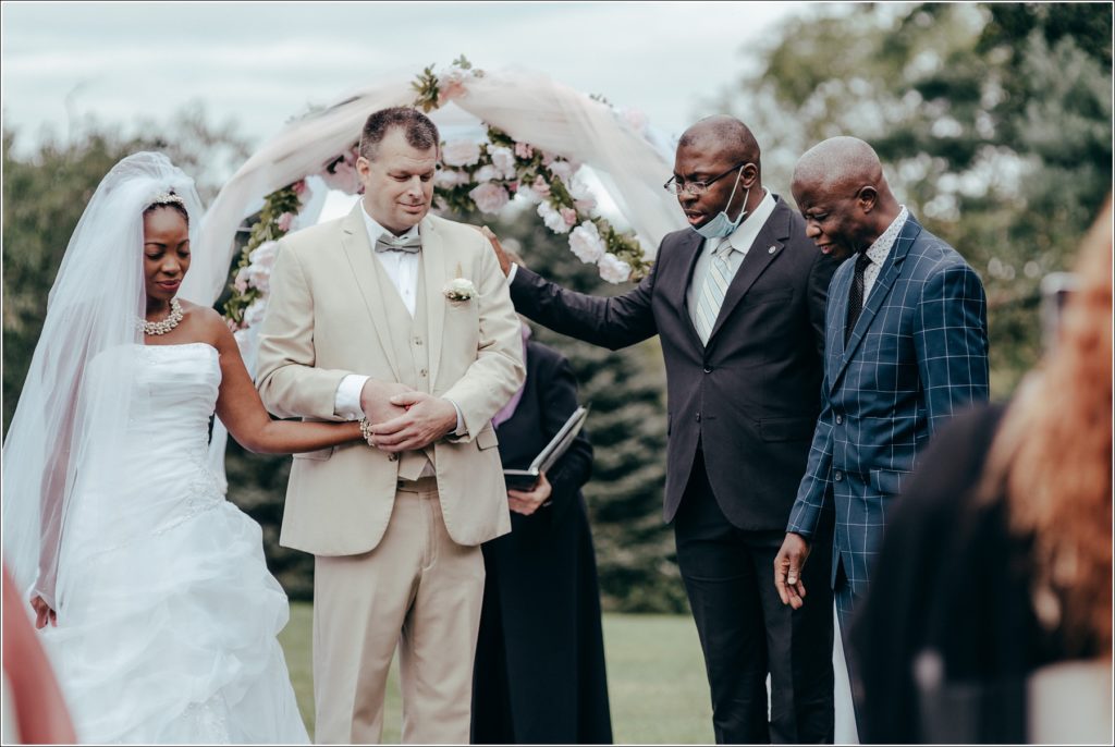 bride and groom during ceremony at kings contrivance restaurant