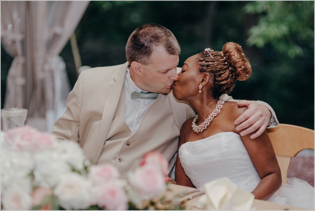 bride and groom kiss at wedding at kings contrivance restaurant