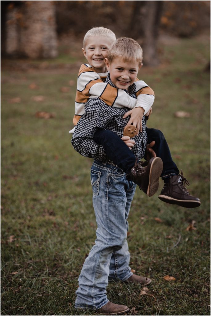 piggy back ride with brothers