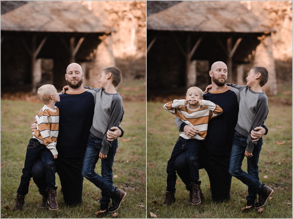 two boys make funny faces with their dad in the fall at catoctin furnace