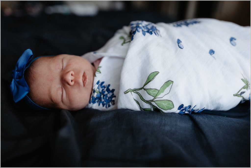 newborn on bed captured by maryland newborn photographer