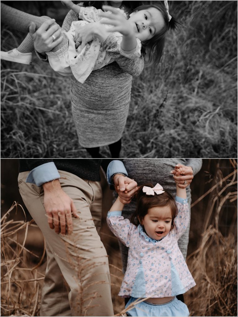 daughter plays with mom and dad in silver spring for family photos