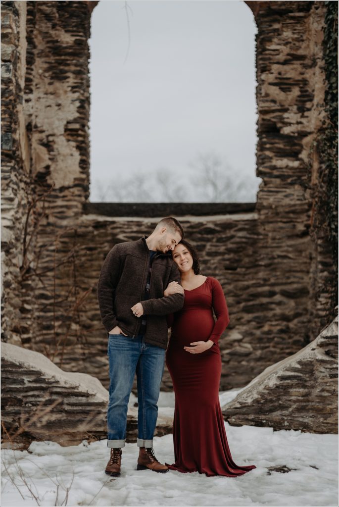 pregnant couple with maryland maternity photographer at ruins at st.johns in harpers ferry