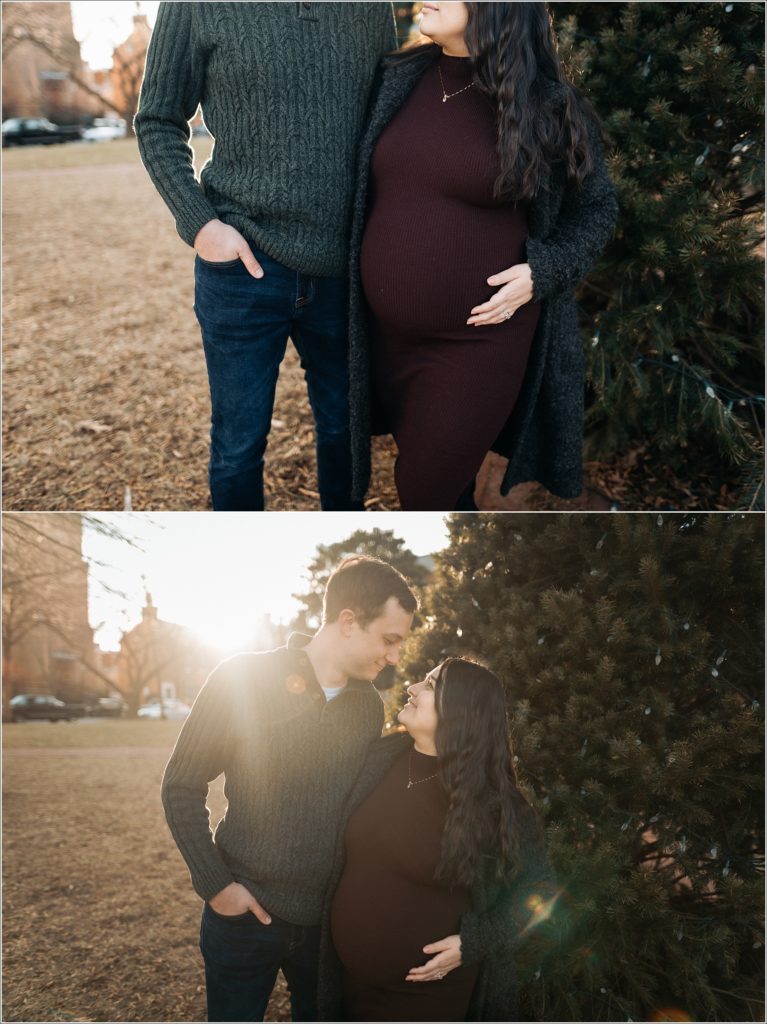 mand and pregnant woman in purple maternity sweater dress and grey coat pose outside for Frederick winter maternity shoot