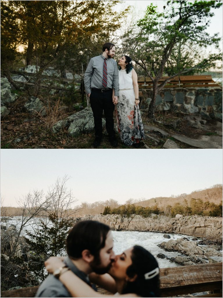 couple snuggles up at sunset with grey button and red tie and white dress with pearls at great falls state park for photoshoot