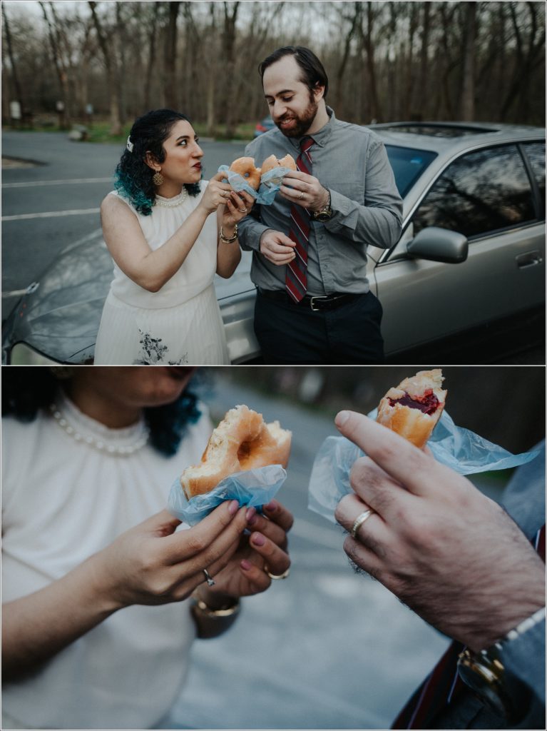 couple eats donuts in celebration of couples dc photoshoot at great falls virginia sitting against their car