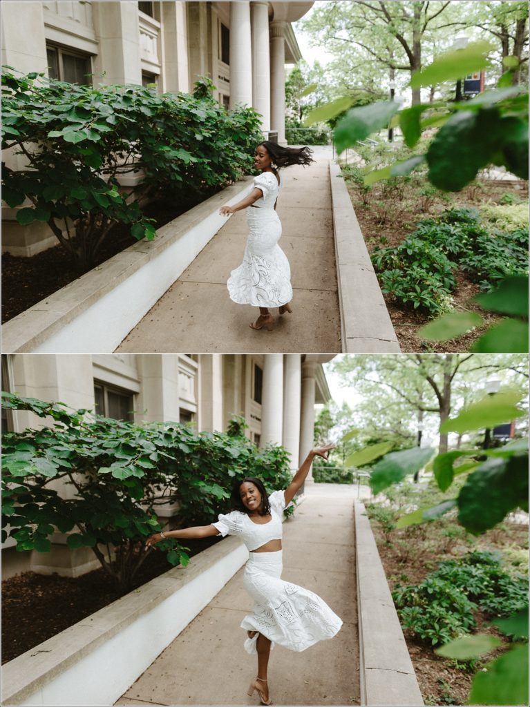 graduation photos in front of kogod school of business in white dress dances
