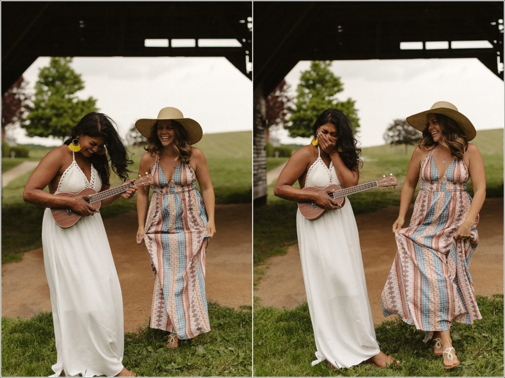 best friends in sundresses laugh while playing ukulele in best friends photoshoot in frederick md