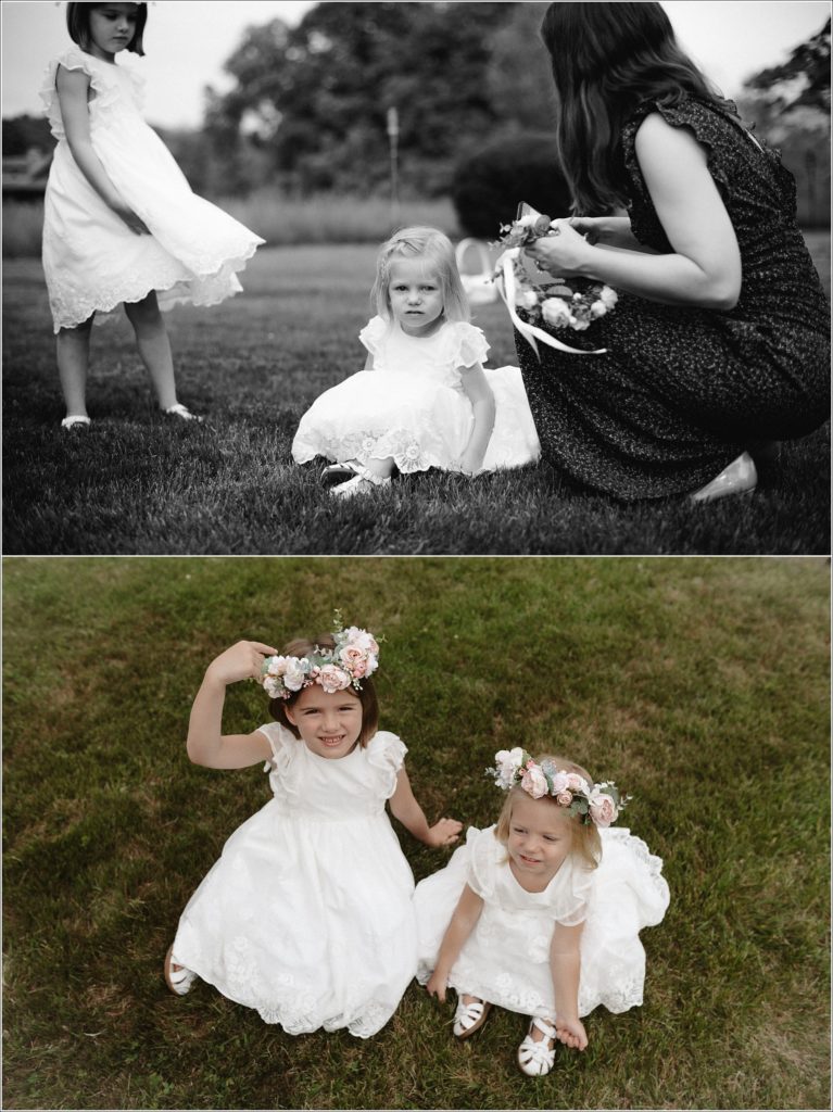 flower girls get ready with mother in white dresses on lawn in bristol backyard wedding