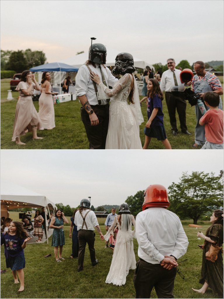 couple poses with star wars helmets in tennessee backyard wedding